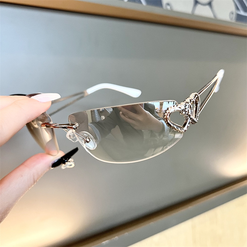 Nieuwe ovale Cat Eye frameloze - Sunglasses Cat Eye recensie en prijs